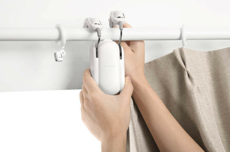 Switchbot gordijnmotor voor roedegordijnen met automatische bediening en app bediening